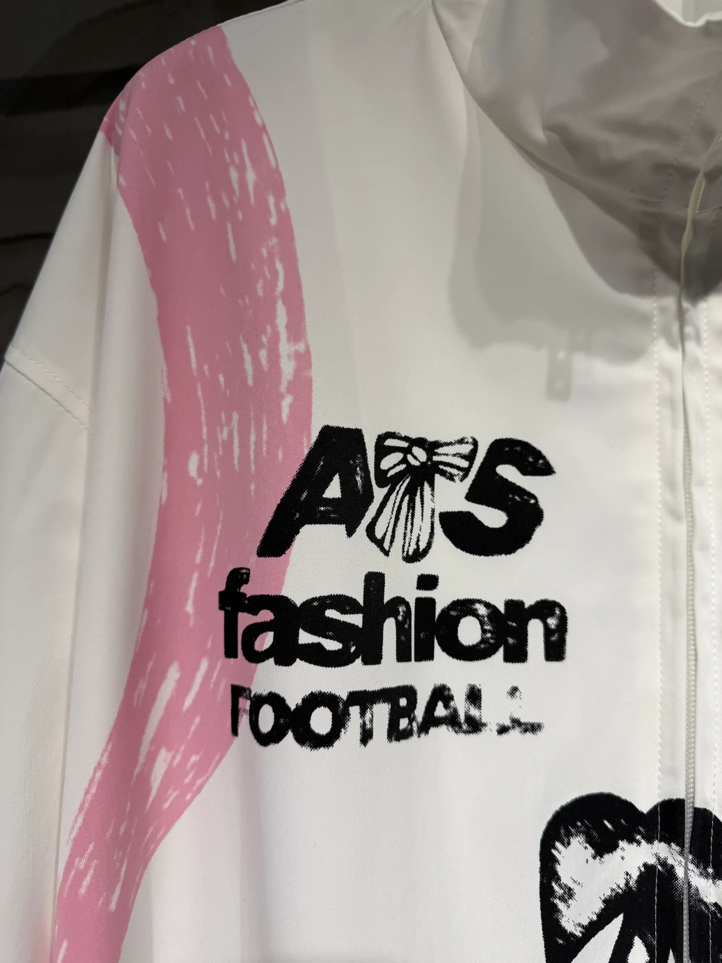 Acne studios World Cup Fashion Football Series Capsule Jacket Printed Jacket A capsule Series full of fun. Doodles, sketches and handwriting are all transformed into intentional designs. Imperfect lines and intuitive brushstrokes create a sense of reality, like a signed jersey or a message in the locker room. Each item carries a story, a memory, and a signature. Size: SML Color: Black, White